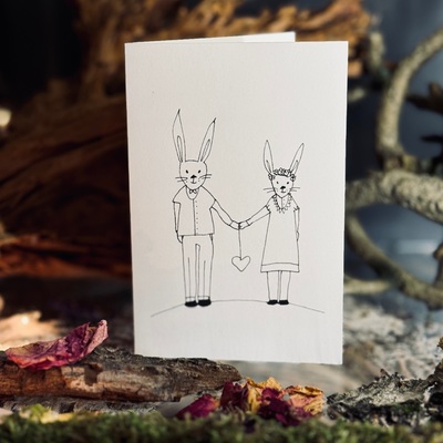 Drawn opening cards with an envelope